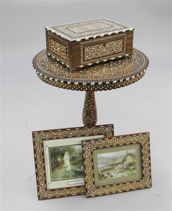 An early 20th century Indian ivory and bone inlaid circular tripod table, table W.1ft 8in.